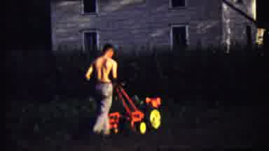 Saint Francis Kansas (1958): A Man To Working In A Agriculture Land Using Aching