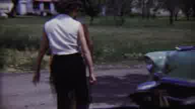 Saint Francis Kansas (1958): Two Ladies And A Dog Examining An Old Green