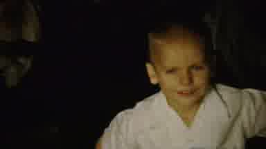 Saint Francis Kansas (1958): Small Child And Woman Wearing White Shirts Smile At