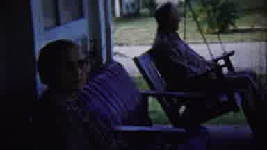Chadron Nebraska (1959): A Man And The Women Relaxing In The Outside Of The House