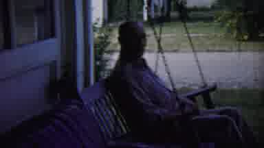 Chadron Nebraska (1959): A Man Sitting And Watching All Over Outside The House In