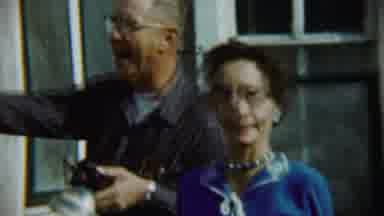 Chadron Nebraska (1959): A Woman In Glasses With Husband Or Son With Someone With