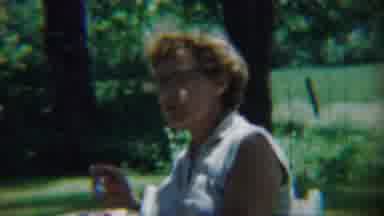 Chadron Nebraska (1959): A Lady Enjoys The Food Inside The Park With No One Near