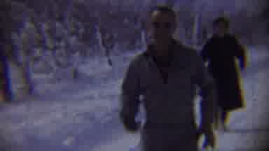 Chadron Nebraska (1959): Man And Woman Running Down A Snowy Country Road