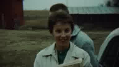 Chadron Nebraska-1959: Woman Wearing White Coat Walks Away From Camera On A Farm