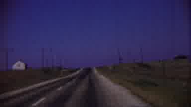 Cheyenne County Kansas (1959): A Car Moving In The Road With Slow Speed And The