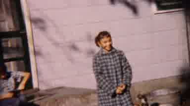 Cheyenne County Kansas (1959): A Dag Is Playing In The Ground The Family Members