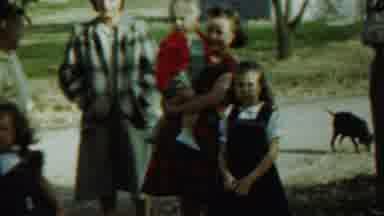 Saint Francis Kansas (1959): A Baby Held By Her Older Sibling In A Social