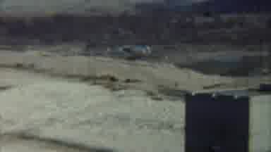 Saint Francis Kansas (1959): View Of White Concrete Tower And Tan Field On A Sunny