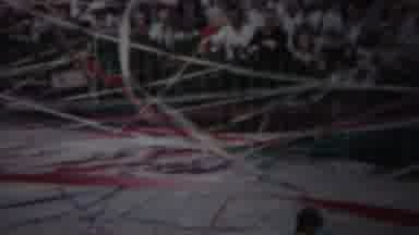 Yokohama Japan (1954): Man Wearing Blue Shirt Walks Underneath Red And White