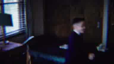 South Bend Indiana (1958): Boy Wearing Black Suit Steps Up Onto Black Wooden