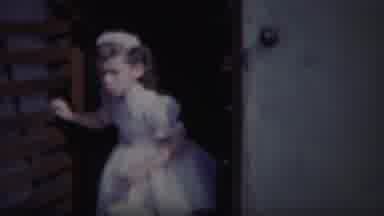 South Bend Indiana (1958): Young Flower Girl Prepares To Go Out The House