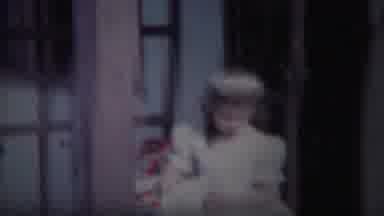 South Bend Indiana (1958): Girl Wearing White Dress And Holding White Basket Walks