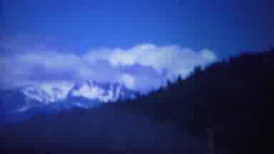 Yellowstone Wyoming (1967): A Beautiful Landscape With Some Mountains With Trees