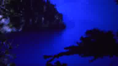 Yellowstone Wyoming (1967): View Of Snow Covered Mountain Slope Blue Water And