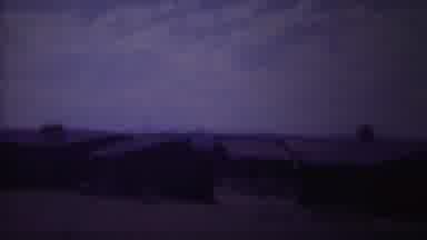 Yellowstone Wyoming (1967): Outside In A Darkened Shot With Many Different Houses