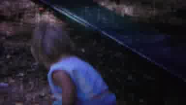 Yellowstone Wyoming (1967): Woman Wearing Blue Shirt Hangs Laundry On Clothesline