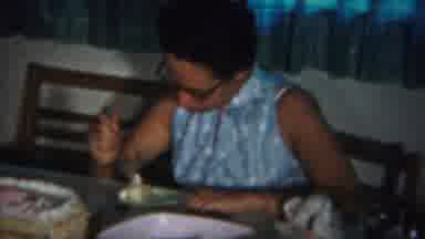 Westville New Jersey (1951): Woman In Blue Dress With Glasses Eats A Piece Of