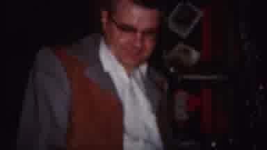 Westville New Jersey (1951): Man Wearing Grey Jacket Hangs Blue Ornament On
