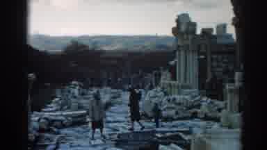 Ephesus Turkey (1962): Three People Walking Amongst Stone Ruins On A Clear Day