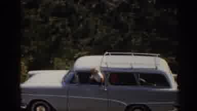 Ephesus Turkey (1962): Person Wearing White Shirt Looks Out Window Of Grey Car On