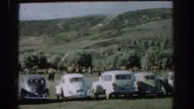 Izmir Turkey (1962): Cars Lined Up In Hilly Field Man Wearing Khaki Woman Wearing