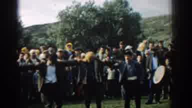 Izmir Turkey (1962): Men Dancing To Drum Music In Front Of A Crowd
