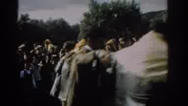 Izmir Turkey (1962): View Of Men Dancing And Man Wearing Tan Jacket Poses With