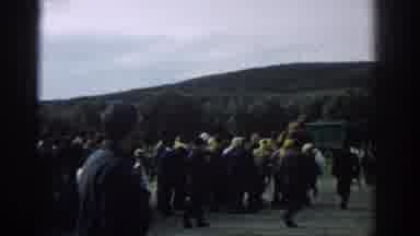 Izmir Turkey (1962): Loaded Camels Fighting While People Watch