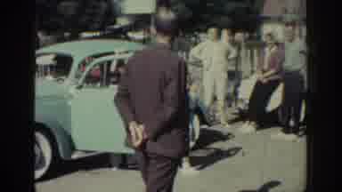 Rhodes Greece (1962): Man Observing Other People In Traffic