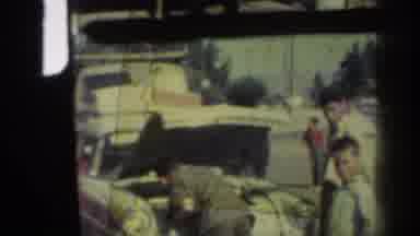 Rhodes Greece (1962): Three Chinese People Standing By A Car And Then Changes To