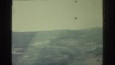Rhodes Greece (1962): Passing View Of Tree Covered Hills On A Cloudy Day