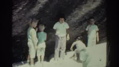 RHODES GREECE-1962: Children Playing Under Rock Formation And Landscape View