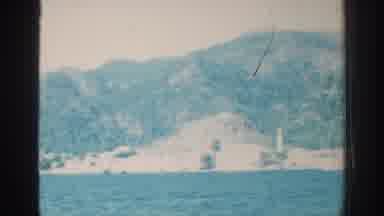 RHODES GREECE-1962: Coastal View With Blue Water And Mountains