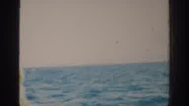 RHODES GREECE-1962: Looking Out At The Sea On A Cloudy Day From A Boat That Is Moving