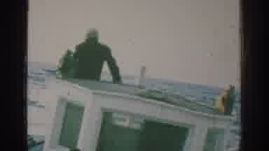 Rhodes Greece (1962): Man And Woman On A Small Boat That Is Rocking Side To Side