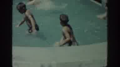 Rhodes Greece (1962): Two Young Boys Are Swimming At A Pool They Appear To Be