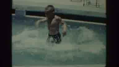 RHODES GREECE-1962: A Boy Jumping and Splashing in a Pool