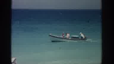 RHODES GREECE-1962: Boat Rides By A Group Of Friends On The Beach