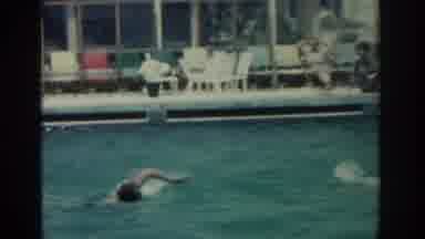 Rhodes Greece (1962): Man Swims Breaststroke In Pool On A Bright Sunny Day