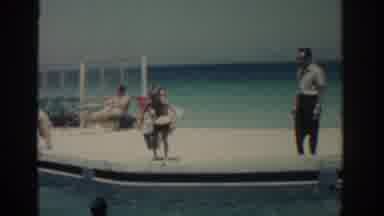 Rhodes Greece (1962): Small Boy Jumps Into Water From-white Platform On A Bright