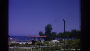 Rhodes Greece (1962): Resort Next To The Ocean Surrounded With Palm Trees And Blue