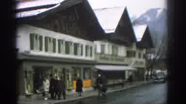 Munich Germany (1963): Stores In Munich Germany With Mountains In The Background