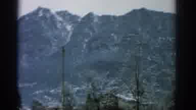 Munich Germany (1963): View Of Green Trees And Mountains On A Clear Day