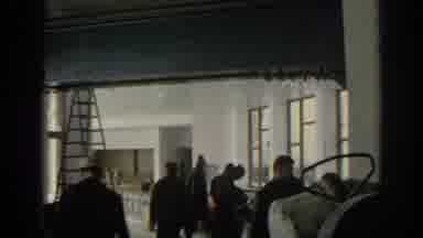 Munich Germany (1963): Woman Wearing Green Coat Talks With People Inside