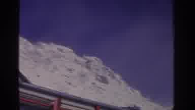 Munich Germany (1963): Snowy Mountains Towers Electric Post Top Of A Bus