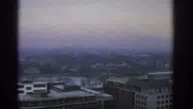 Warsaw Poland (1963): A View Off The Top Of A Skyscraper At Dusk Which Cuts To The