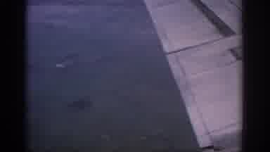 Warsaw Poland (1963): Aerial View Of Wing Flaps Lowering During Flight On A Clear