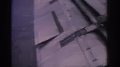WARSAW POLAND-1963: View Out Of Jet Airplane Window During Flight Wing Flaps And