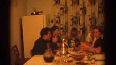 Zurich Swizterland (1963): Middle Aged Family Eating Dinner Around A Table On